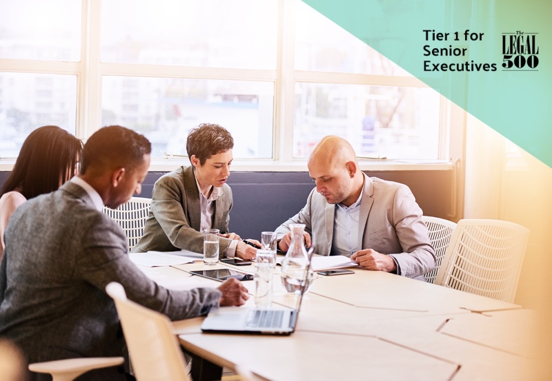 Senior Executives talking around a table