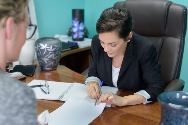 employment lawyer looking at a contract