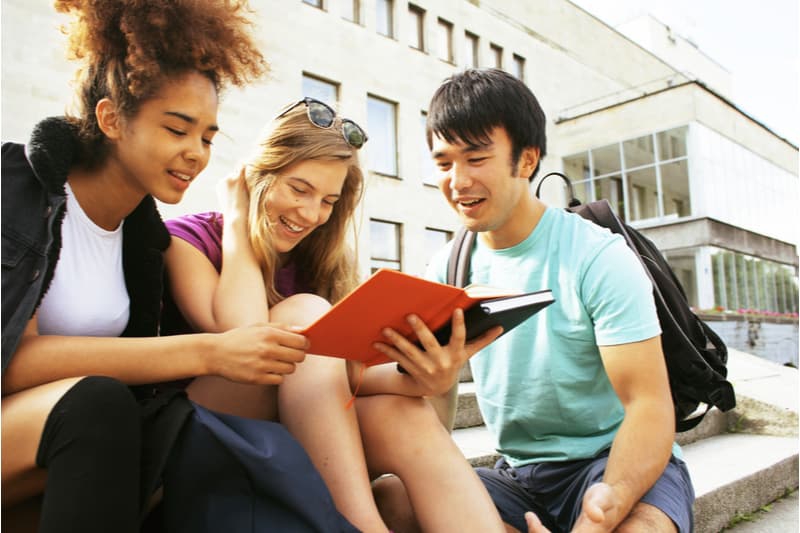 international students sitting and chatting happily