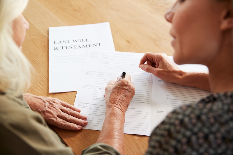 person signing a will