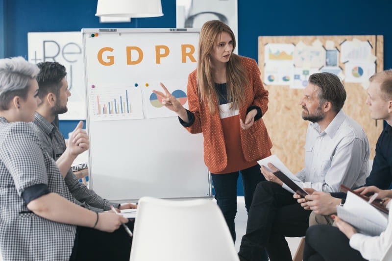 lady carrying out GDPR training on a whiteboard