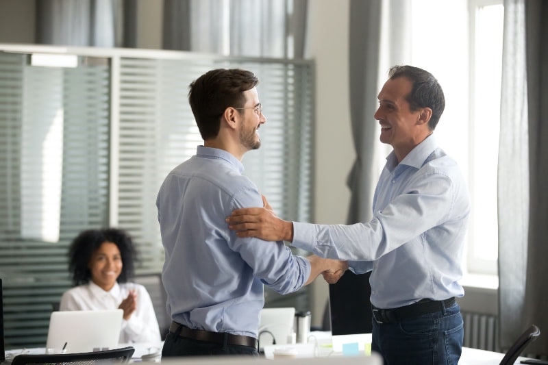 two businessmen shaking hands