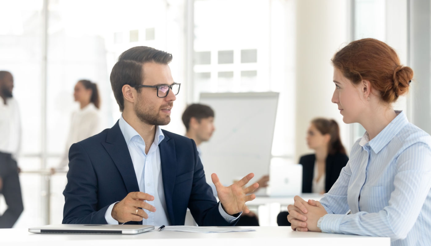 Recruitment lawyer chatting to a lady