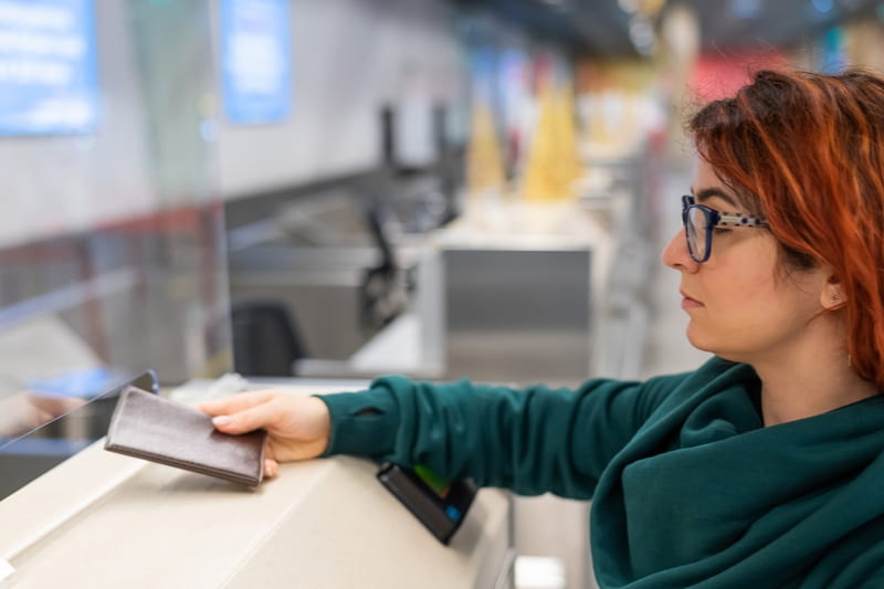 lady showing her passport