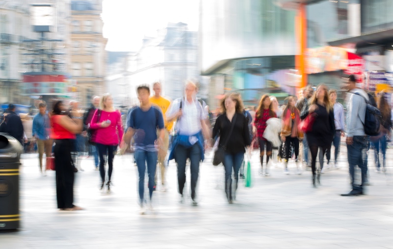 tourist and shoppers on a street