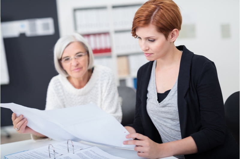 woman investigating a work issue