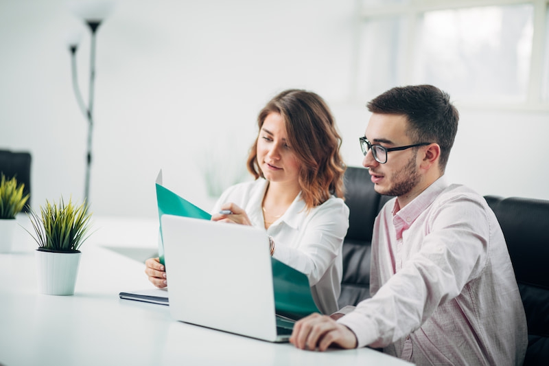 2 lawyers discussing a document