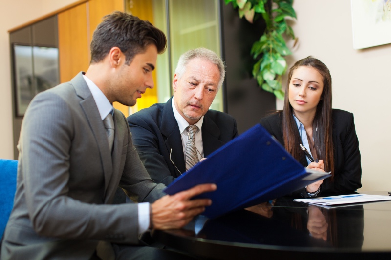 three lawyers conversing